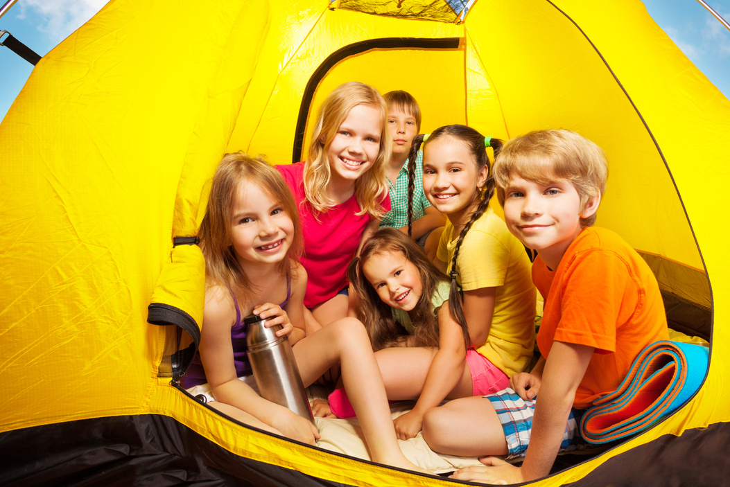 Six Nice Kids Looking from Camping Tent